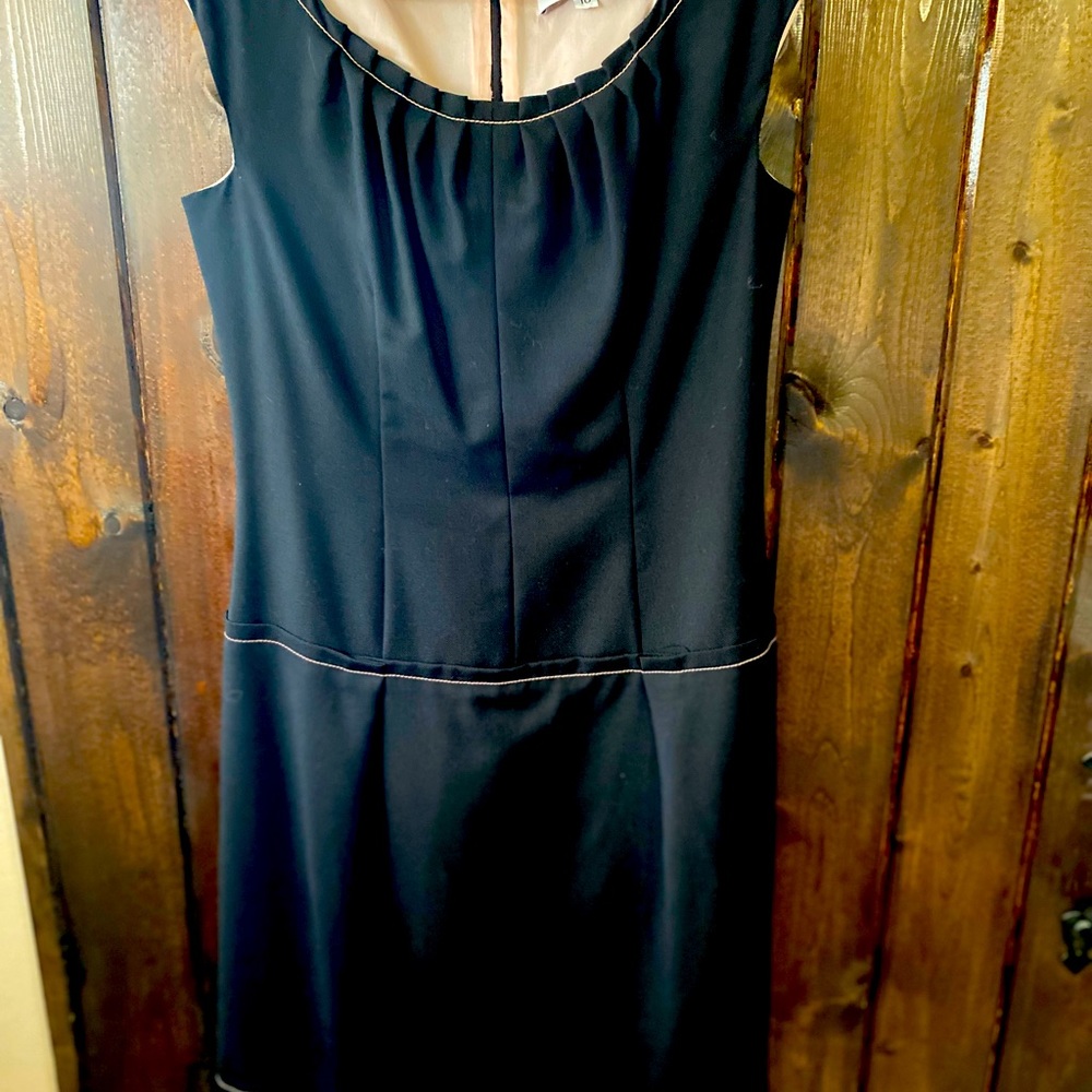 Black dress with pink stitch